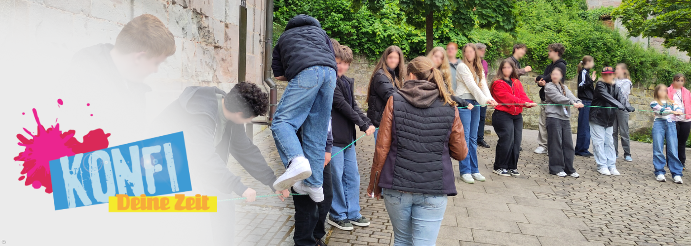 Konfis spannen ein Seil auf dem jemand balanciert